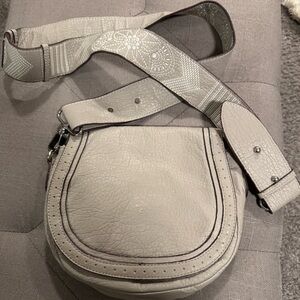 Gray Crossbody Bag with Rounded Shape Adjustable Strap and Flap Closure